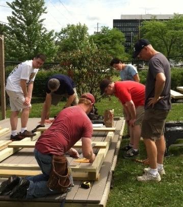 Community volunteers create outdoor “Hobbit Hole” play space at Corning Children’s Center